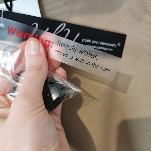 NEW with tags Ubu reversible rain jacket black and neutral with pink accents - Picture 16 of 16